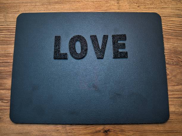 Love - Black Lettering on Black Background
