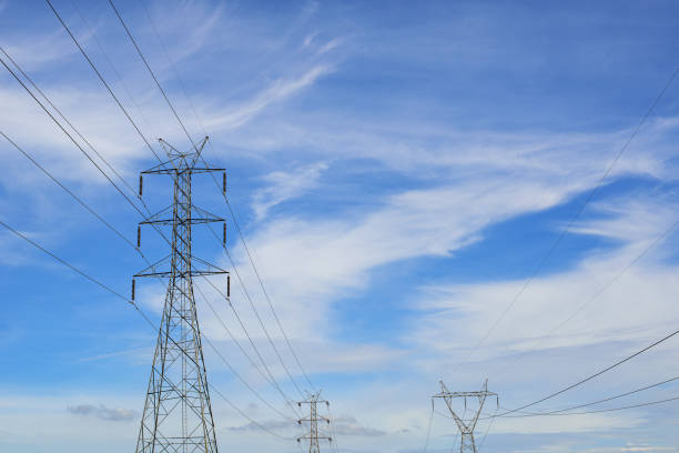istock High voltage power transmission tower and sky background 1413120992