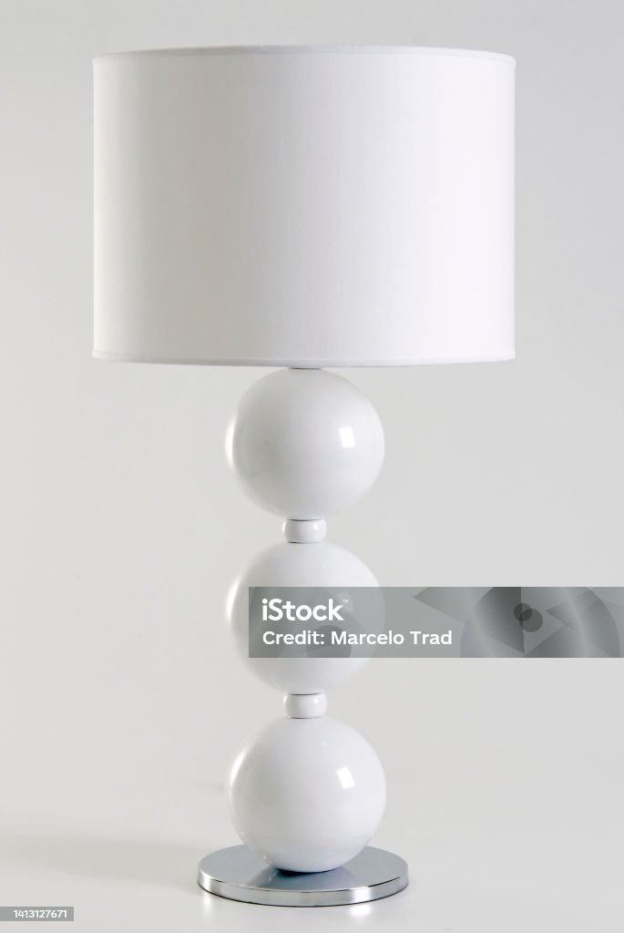 Modern white lamp with balls design and a straight lamp shade, isolated on white Lamp Shade Stock Photo