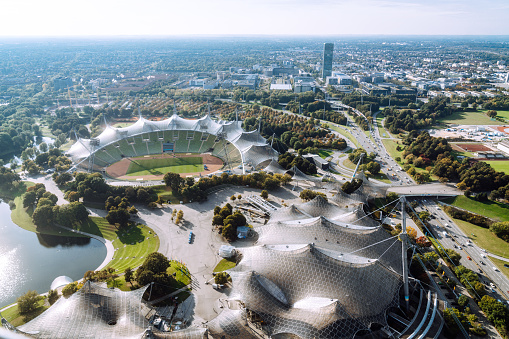 Munich, Germany - October 11, 2021: The Olympic Park Munich viewed from the Olympic Tower in Bavaria, Germany. The Olympic Park Munich was constructed for the 1972 Summer Olympics.