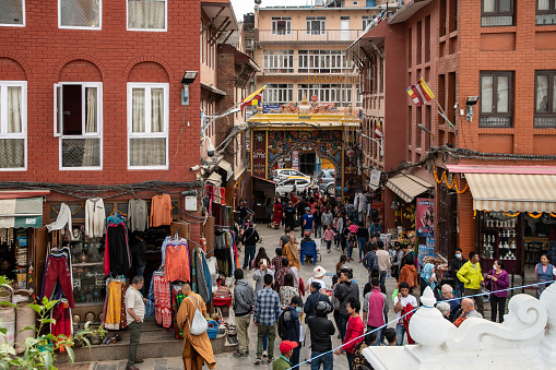 Kathmandu , Nepal - oct 30, 2019: a lot of souvenir shops, eateries and clubs surround the large Boudhanath stupa, the most famous Tibetan stupa in Nepal, Kathmandu