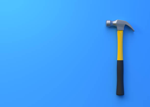 istock Claw hammer with yellow plastic handle isolated on blue background 1413138210