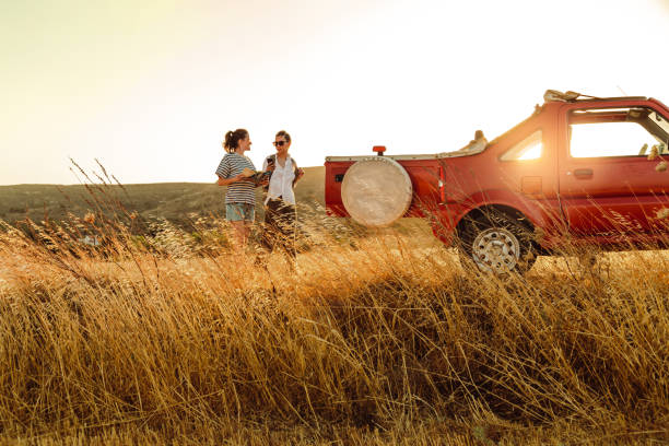 istock Two girls on a road trip 1413138646