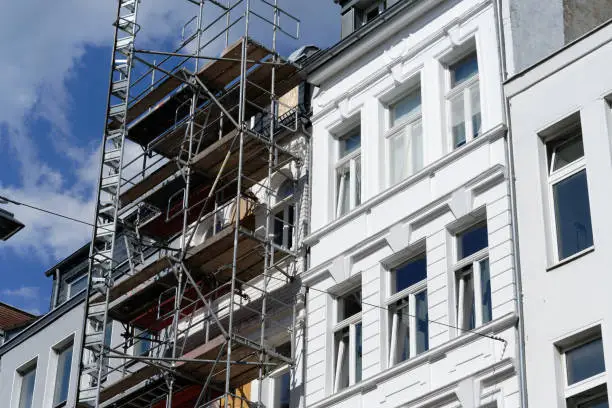 Photo of renovated and scaffolded old building