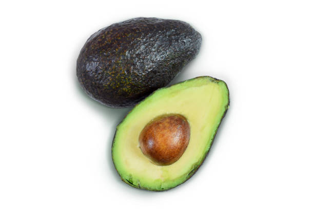 istock Halved Avocado Isolated on White Background with Clipping Path 1413139898