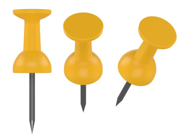 istock Collection yellow push pins isolated on white background 1413139952