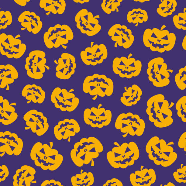 istock Halloween pattern pumpkin yellow color on lilac background for decoration holiday party 1413140165