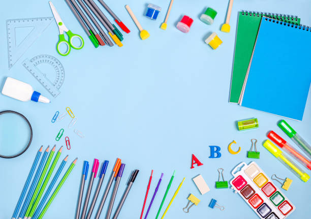istock Various supplies for creativity and learning on a blue background with place for text. 1413142265