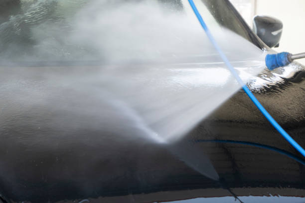 istock Pressure washing the car 1413144191