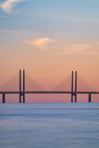 The Oresund Bridge is a combined motorway and railway bridge between Sweden and Denmark (Malmo and Copenhagen). The Oresund Bridge is a combined motorway and railway bridge between Sweden and Denmark (Malmo and Copenhagen). oresund bridge stock pictures, royalty-free photos & images