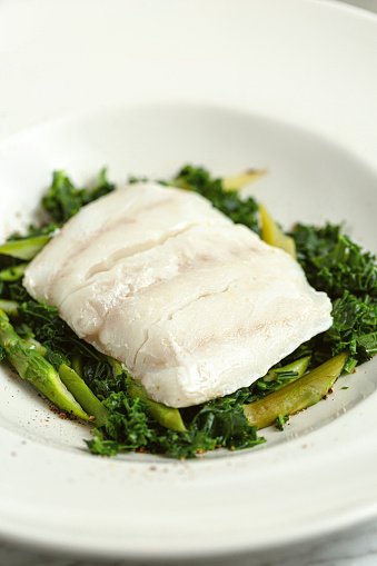 Cod fillet with micro greenery and sauce