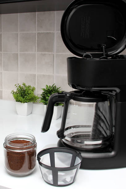 istock Freshly prepared coffee in a filter coffee machine served in white cups that is rich in antioxidants, fights Alzheimer's and Parkinson's, produces tachycardia and insomnia 1413148885