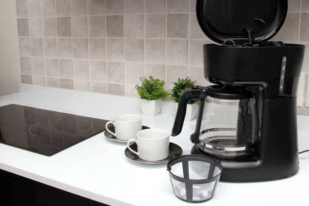 istock Freshly prepared coffee in a filter coffee machine served in white cups that is rich in antioxidants, fights Alzheimer's and Parkinson's, produces tachycardia and insomnia 1413148898