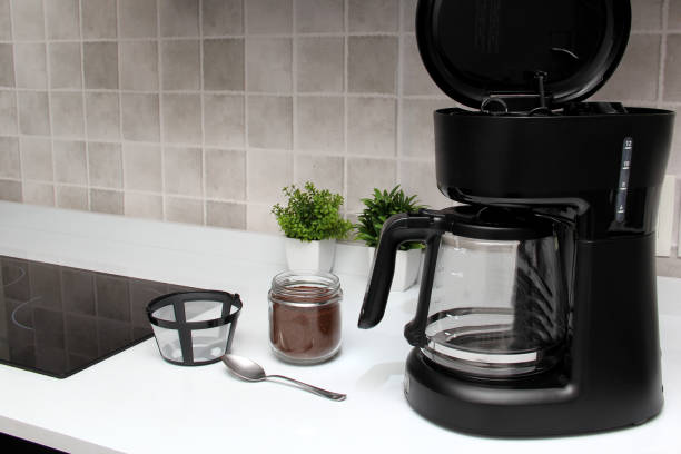 istock Freshly prepared coffee in a filter coffee machine served in white cups that is rich in antioxidants, fights Alzheimer's and Parkinson's, produces tachycardia and insomnia 1413148956