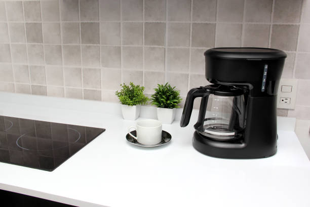 istock Freshly prepared coffee in a filter coffee machine served in white cups that is rich in antioxidants, fights Alzheimer's and Parkinson's, produces tachycardia and insomnia 1413148991