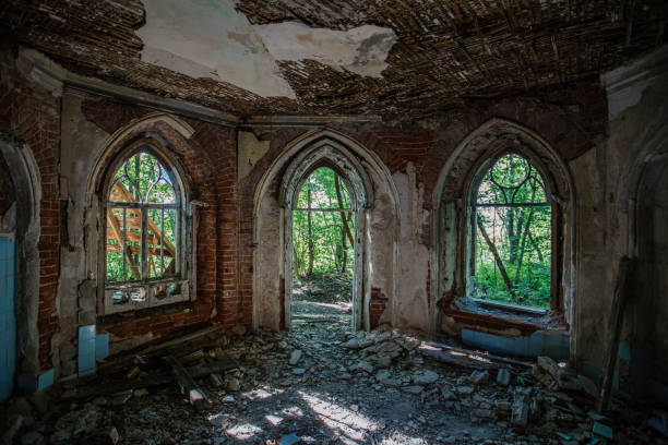 istock Inside old ruined abandoned historical mansion in Gothic style 1413150760