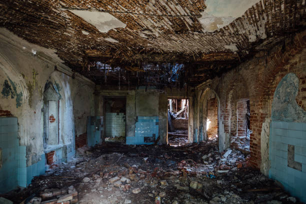 istock Inside old ruined abandoned historical mansion in Gothic style 1413150775