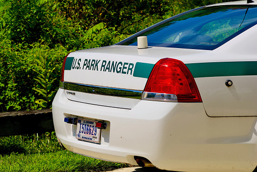 Vienna, Virginia, USA - August 5, 2022: Back end of a U.S. Park Ranger law enforcement vehicle parked at Wolf Trap National Park for the Performing Arts.