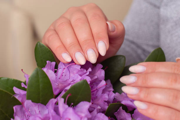 istock Female hands with romantic manicure nails 1413153946