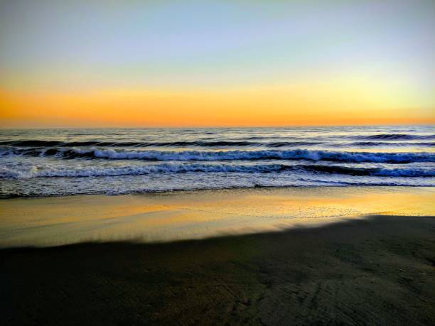 beach at sunset stock photo