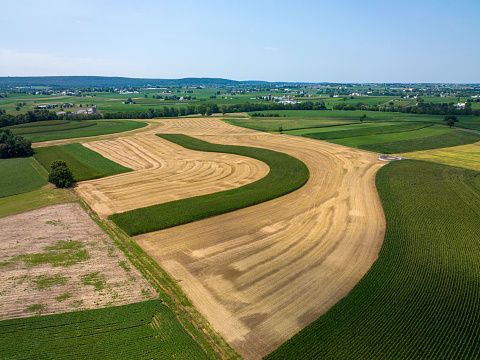 An aerial view of the patchwork fields in the rural countryside.