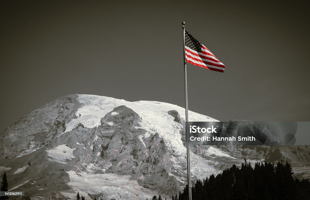 She's Flying American Flag on Mt. Rainier American Flag Stock Photo