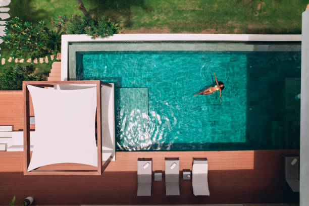 istock Woman swimming in the pool 1413162950