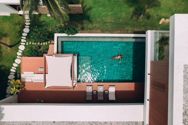 istock Woman swimming in the pool 1413162951
