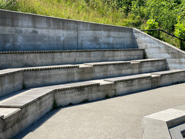 istock Concrete modern seats in a public park 1413168077