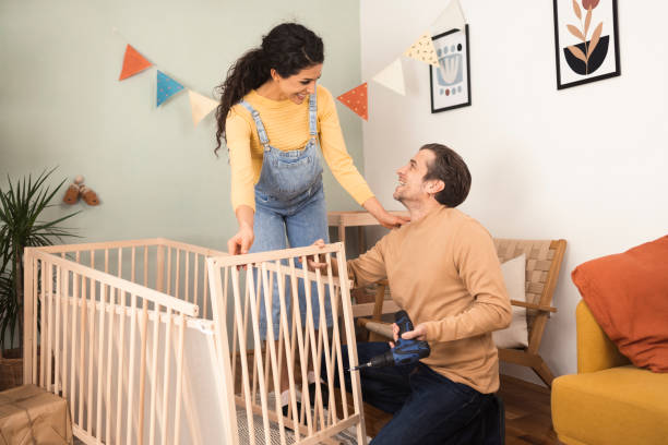 istock Happy future parents preparing for a baby 1413169826