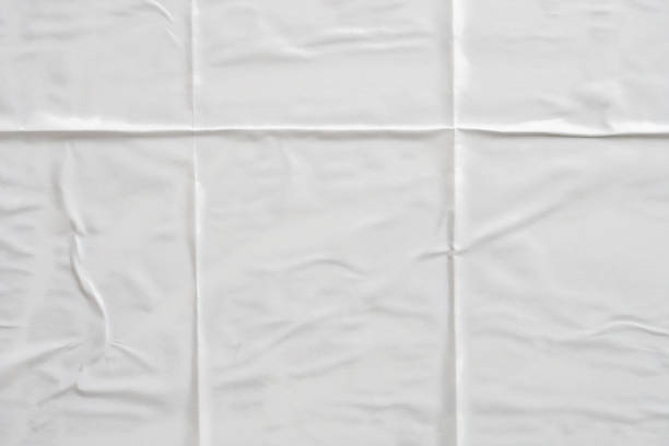 istock white crumpled and creased paper poster texture background 1413170114