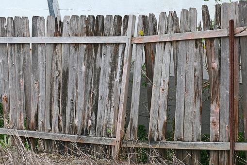 Broken down old wooden fence in need of replacement