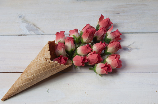Beautiful flowers inside an ice cream cone