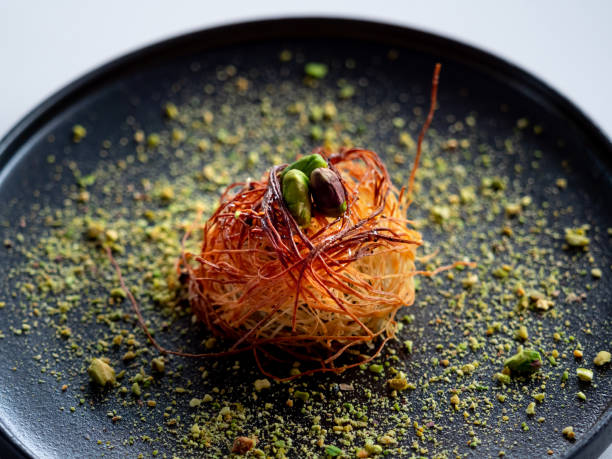 istock Cooked Turkish dessert Kataifi served on a plate 1413192031