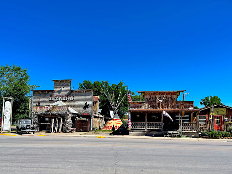 Hulett, Wyoming, USA - July 8, 2022: “Bob’s” and “Wyoming Territory Trading Post” are iconic landmarks on Main Street in the small western town of Hulett.