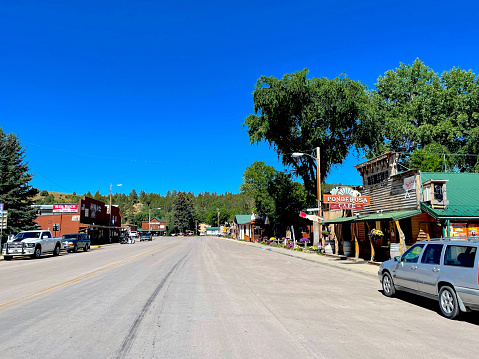 Hulett, Wyoming, USA - July 8, 2022: View looking down Main Street in the small western town of Hulett.