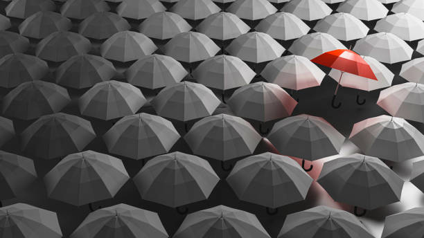 istock Red umbrella for leadership concept 1413193915