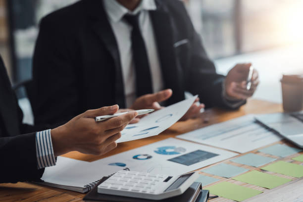 istock Business team meeting and presenting business results discussion and analysis data chart and graph, finance and accounting. Business performance concept. 1413194316