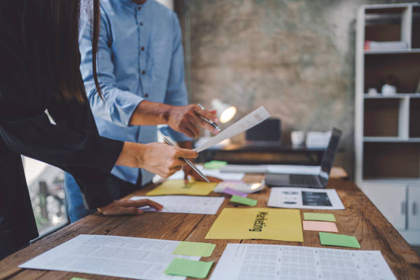 istock Business people are analyzing data graphs to plan business meetings with colleagues to propose collaboration strategies. 1413197318