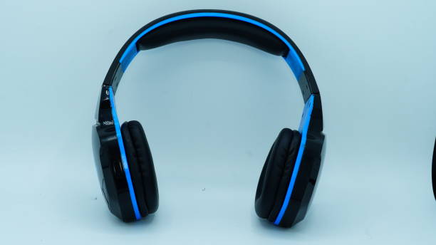 istock Blue headphone images on white background 1413198257