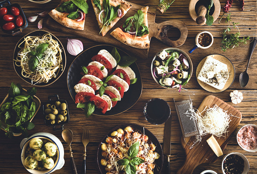 Italian dish. mix of Italian food  on wooden table