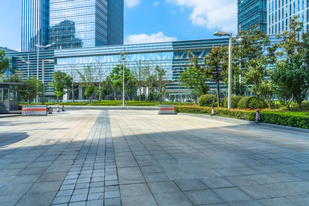 istock empty brick floor front of modern buildings 1413199790