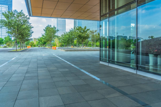istock empty brick floor front of modern buildings 1413199836