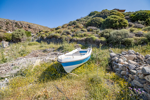 Recreational Boat on Dionyssos Beach at Rethymno Province  in Crete, Greece