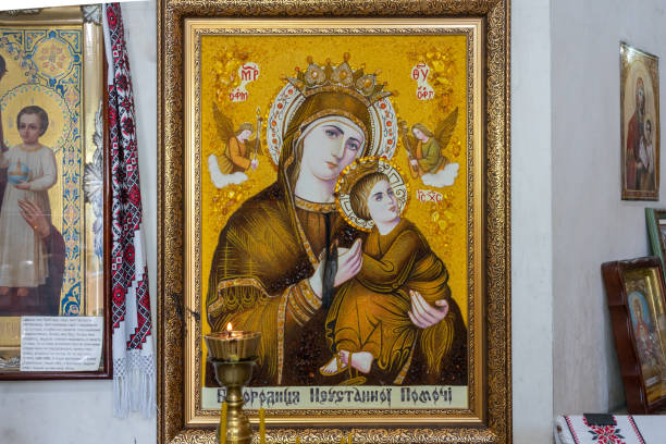 The icon of the Mother of God with a child in her arms in a Christian church stock photo