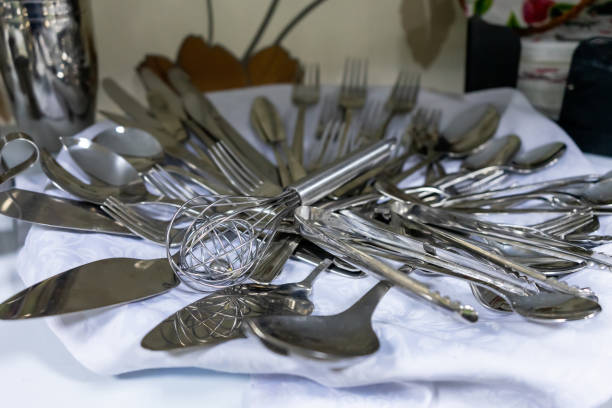 A set of various cutlery and objects. A variety of shiny metal cutlery stock photo