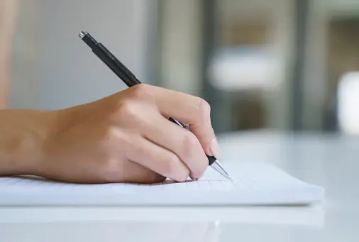 https://media.istockphoto.com/id/1413203899/photo/close-up-of-a-womans-hand-with-pen-writing-on-a-notebook.webp?b=1&s=170667a&w=0&k=20&c=12w1DL0Y47SinItvAkSwCB6JuYKj4TBeb-NPxChLV74=