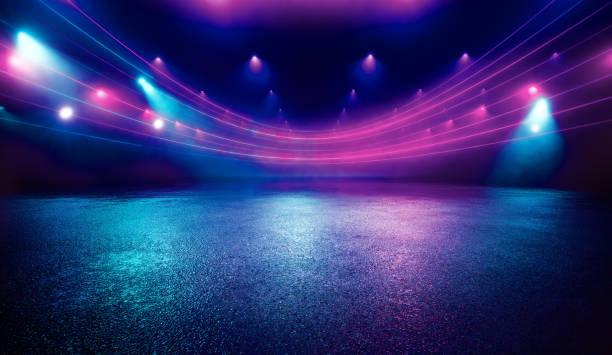 istock Illuminated dark concrete surface surrounded by modern neon colour lights 1413205689