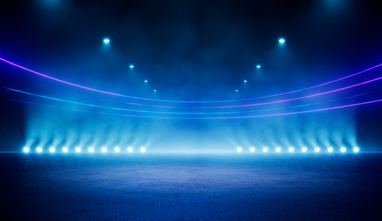 Abstract blue neon stadium background illuminated with lamps on ground. Science, product and sports technology background
