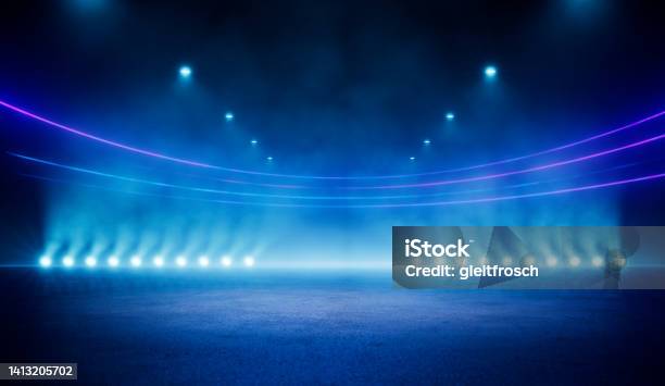 Abstract Blue Neon Stadium Background Illuminated With Lamps On Ground Science Product And Sports Technology Background Stock Photo - Download Image Now